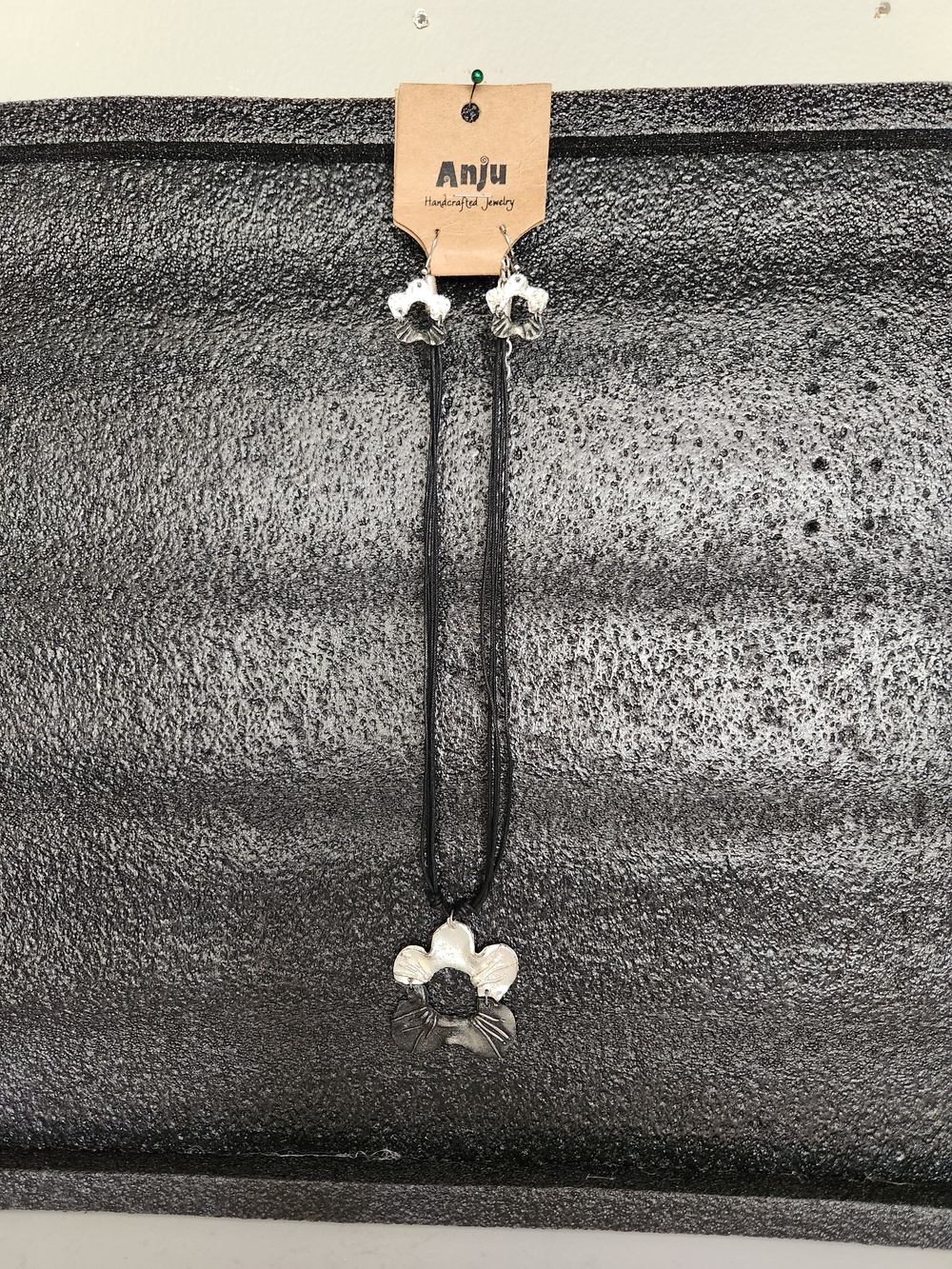 Anju Silver Flower Pendant Necklace in Black